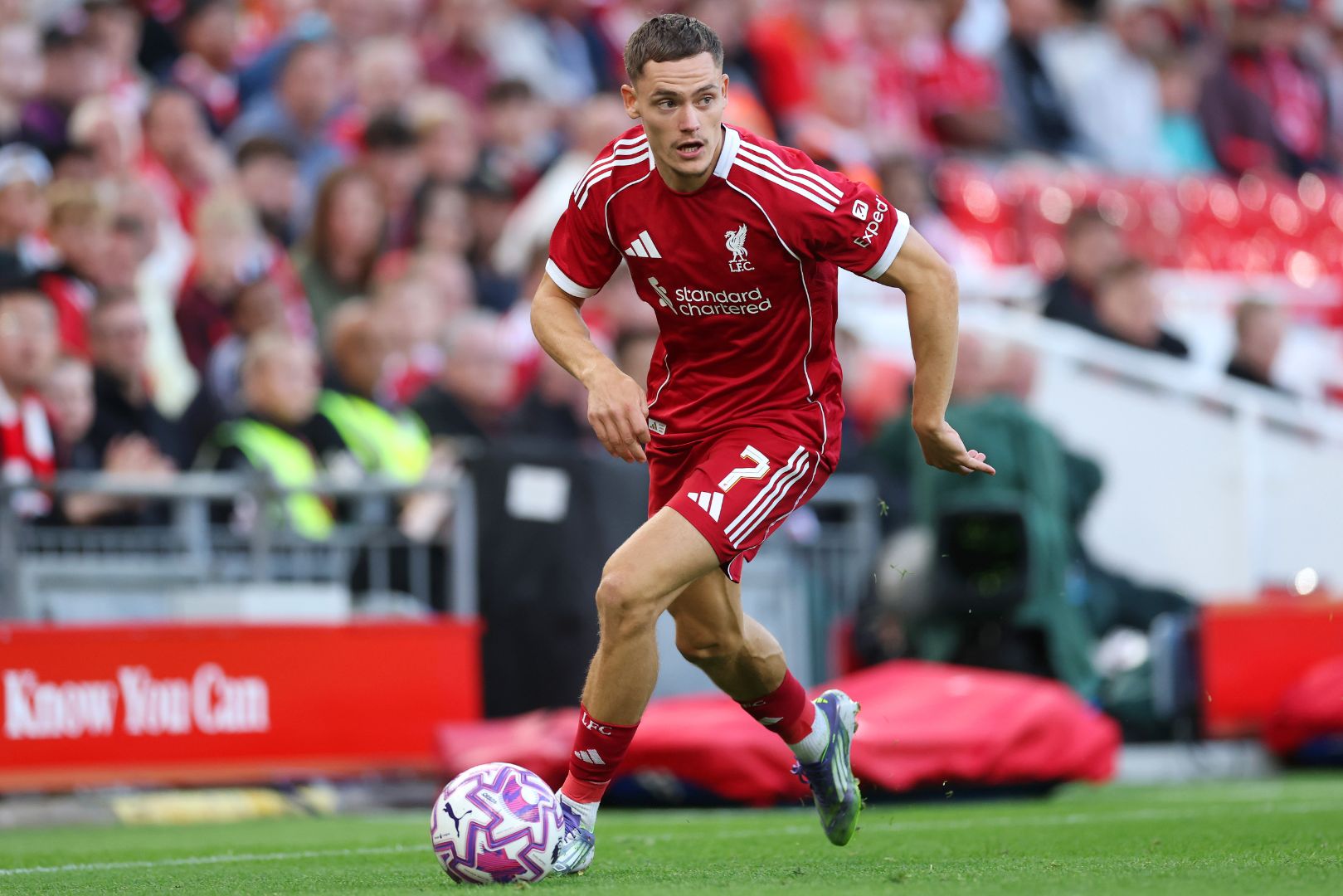 LIVERPOOL, ENGLAND - AUGUST 04: Florian Wirtz of Liverpool runs with the ball during the second pre-season friendly match between Liverpool and Athletic Club Bilbao at Anfield on August 04, 2025 in Liverpool, England.