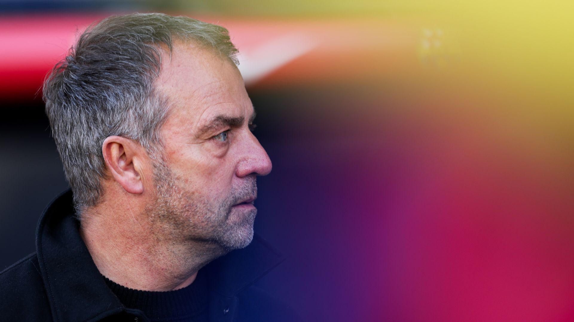 BARCELONA, SPAIN - MARCH 30: Hansi Flick, head coach of FC Barcelona, looks on during the LaLiga match between FC Barcelona and Girona FC at Estadi Olimpic Lluis Companys on March 30, 2025 in Barcelona, Spain.