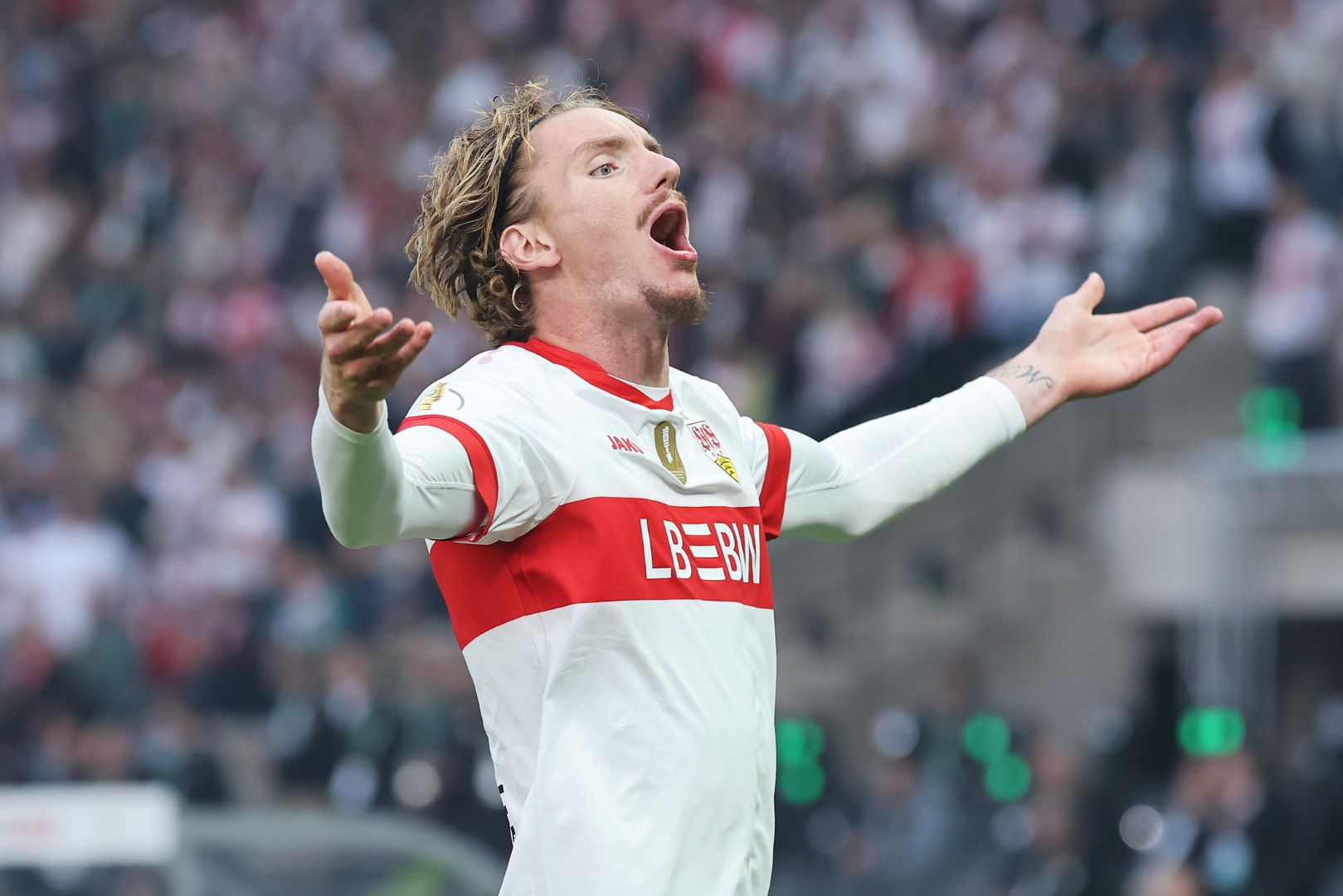 BERLIN, GERMANY - MAY 24: Nick Woltemade of VfB Stuttgart celebrates scoring his team's first goal during the DFB Cup Final 2025 between DSC Arminia Bielefeld and VfB Stuttgart at Olympiastadion on May 24, 2025 in Berlin, Germany.
