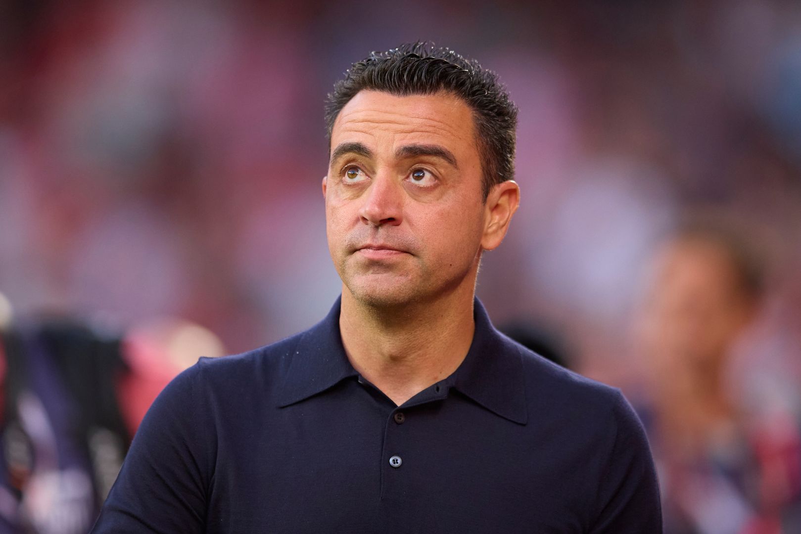SEVILLE, SPAIN - MAY 26: Xavi, Head Coach of FC Barcelona, looks on before the LaLiga EA Sports match between Sevilla FC and FC Barcelona at Estadio Ramon Sanchez Pizjuan on May 26, 2024 in Seville, Spain.
