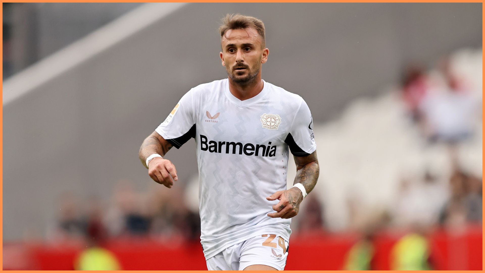 Aleix Garcia of Leverkusen runs with the ball during the pre-season friendly match between Rot-Weiss Essen and Bayer 04 Leverkusen at Stadion an der Hafenstrasse.