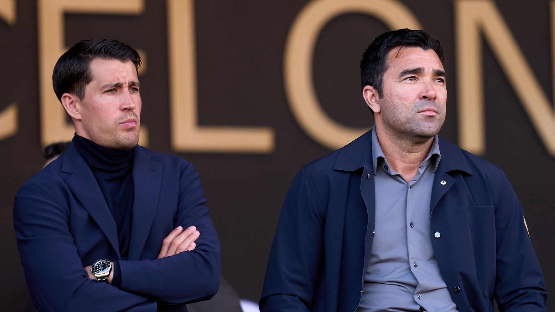 BARCELONA, SPAIN - MAY 11: (L-R) FC Barcelona Football Coordinator Bojan Krkic, and FC Barcelona Director of Football Anderson Luis de Souza 'Deco' look on from the presidential box prior to the LaLiga match between FC Barcelona and Real Madrid CF at Estadi Olimpic Lluis Companys on May 11, 2025 in Barcelona, Spain.