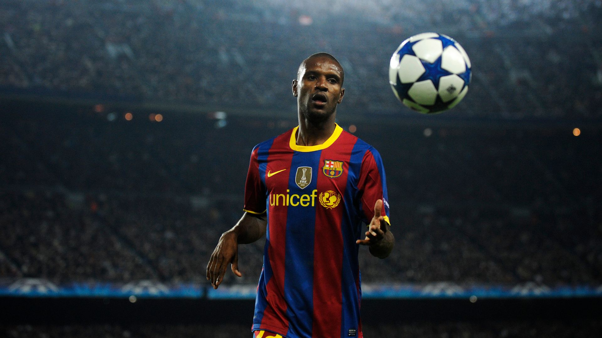 BARCELONA, SPAIN - OCTOBER 20: Eric Abidal of Barcelona runs to catch the ball during the UEFA Champions League group D match between Barcelona and FC Copenhagen at the Camp nou stadium on October 20, 2010 in Barcelona, Spain. Barcelona won the match 2-0.