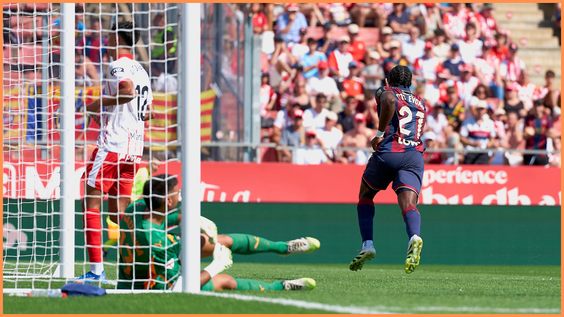 Karl Etta Eyong of Levante UD celebrates after scoring his team's first goal during the LaLiga EA Sports match between Girona FC and Levante UD at Montilivi Stadium.
