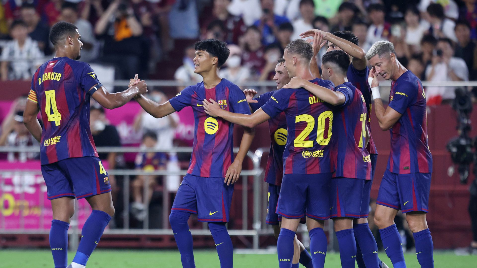 KOBE, JAPAN - JULY 27: FC Barcelona's Pedro Fernandez (C) is congratulated after scoring a gosal during the preseason friendly between Vissel Kobe and FC Barcelona at Noevir Stadium Kobe on July 27, 2025 in Kobe, Hyogo, Japan.