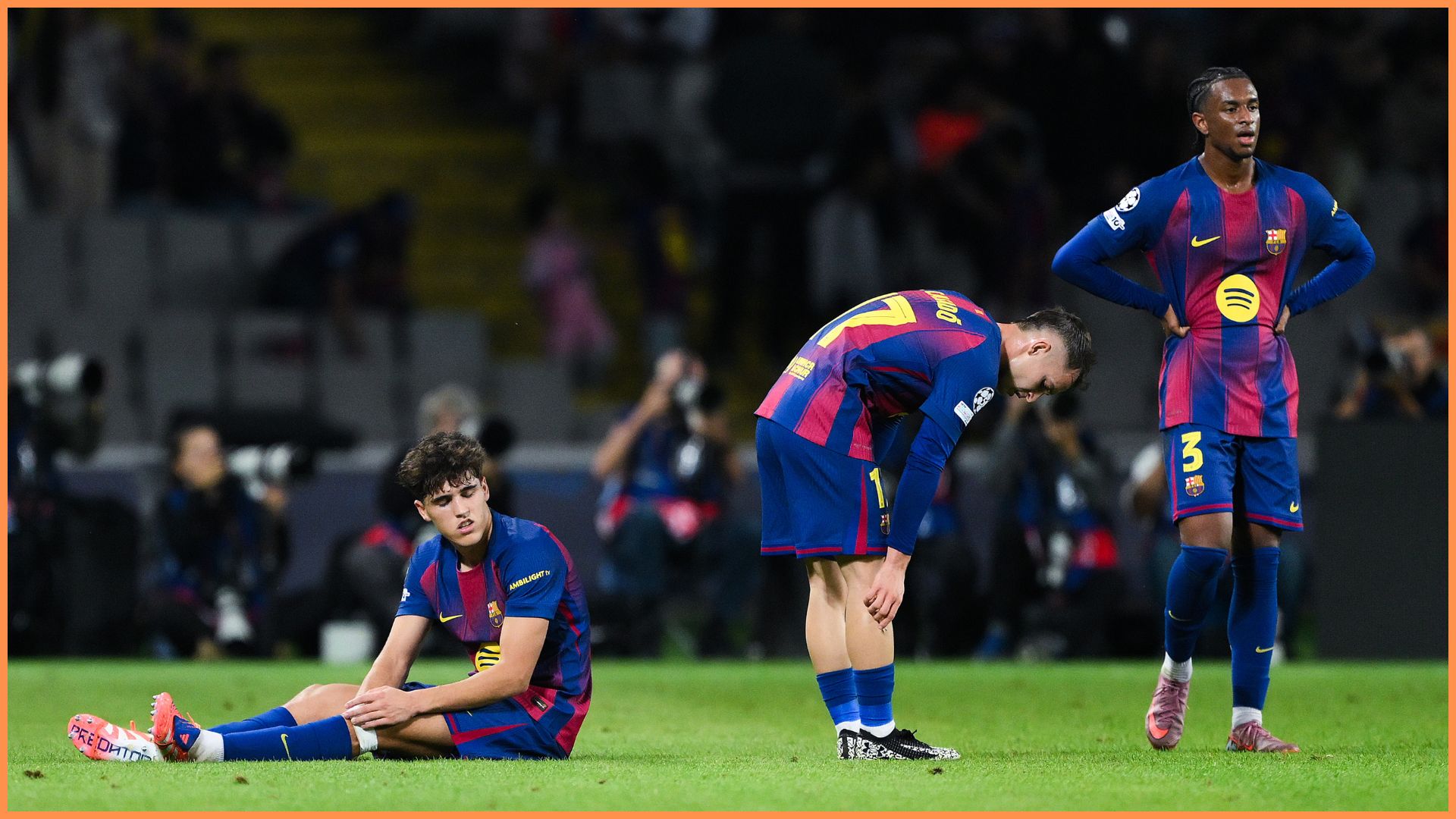 BARCELONA, SPAIN - OCTOBER 01: (L-R) Pau Cubarsi, Marc Casado and Alejandro Balde of FC Barcelona show their dejection at the end of the UEFA Champions League 2025/26 League Phase MD2 match between FC Barcelona and Paris Saint-Germain at Estadi Olimpic Lluis Companys on October 01, 2025 in Barcelona, Spain.