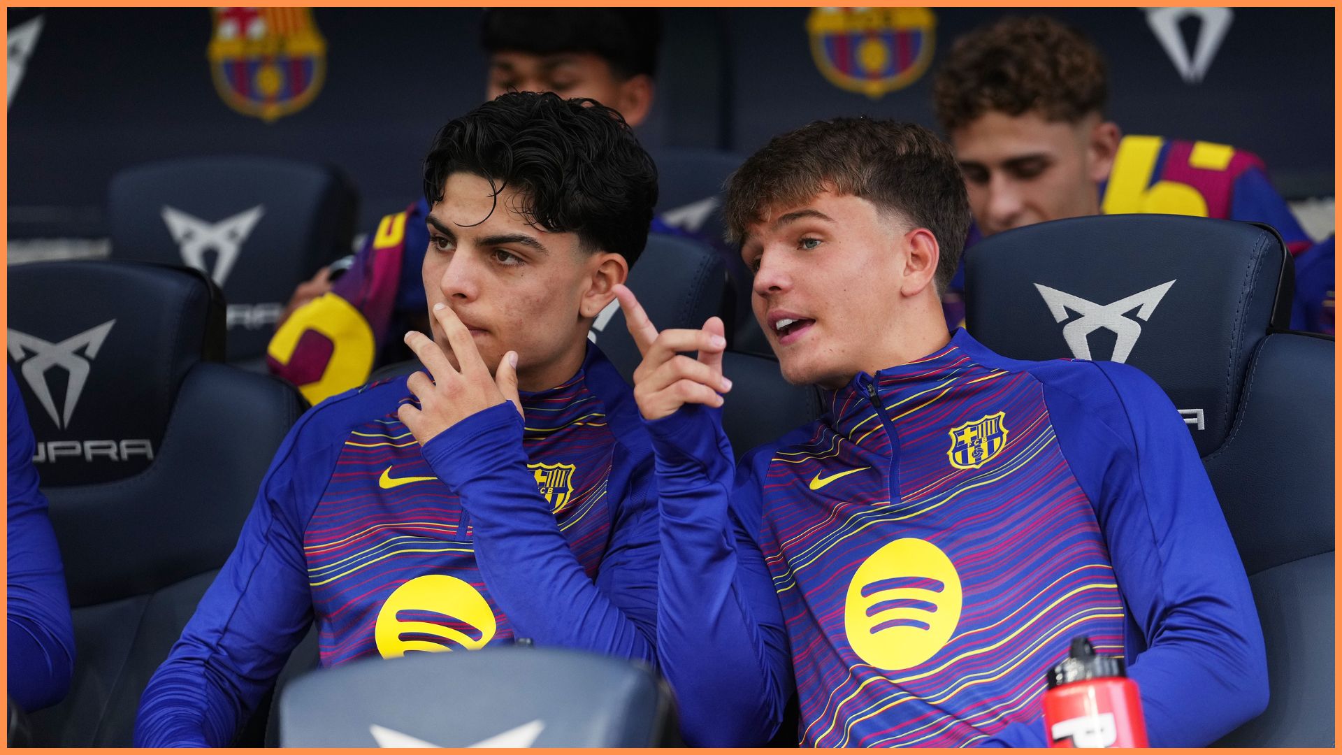 BARCELONA, SPAIN - OCTOBER 18: Xavi Espart and Juan Hernandez of FC Barcelona talk from the bench prior to the LaLiga EA Sports match between FC Barcelona and Girona FC at Spotify Camp Nou on October 18, 2025 in Barcelona, Spain.