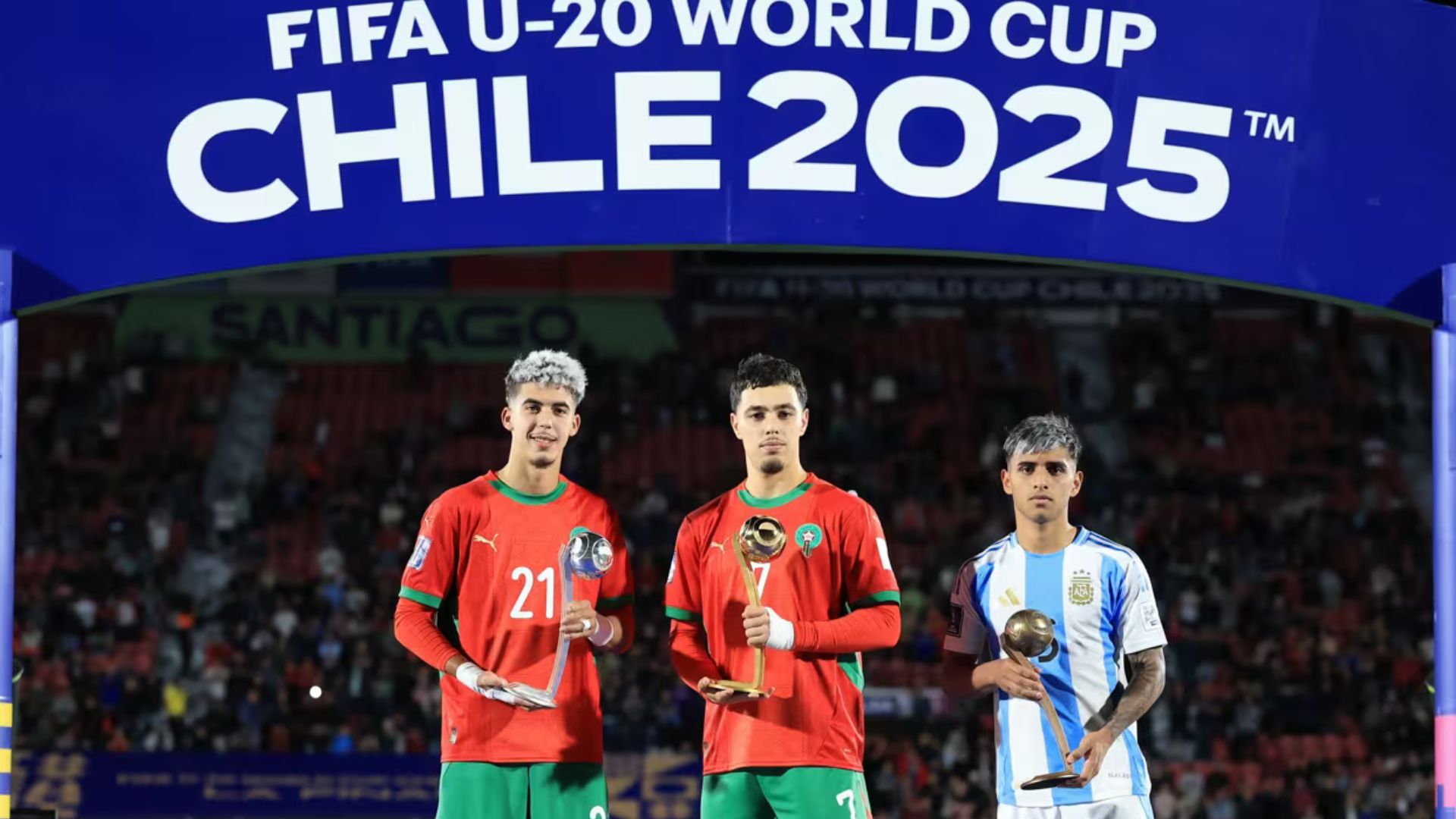 Othmane Maamma of Morocco poses with the adidas Golden Ball Award, Yassir Zabiri of Morocco poses with the adidas Silver Ball Award during the award and Milton Delgado of Argentina poses with the adidas Bronze Ball during the award ceremony following the FIFA U-20 World Cup Chile 2025 final match between W49 and W50 at Estadio Nacional Julio Martínez Prádanos on October 19, 2025 in Santiago, Chile.