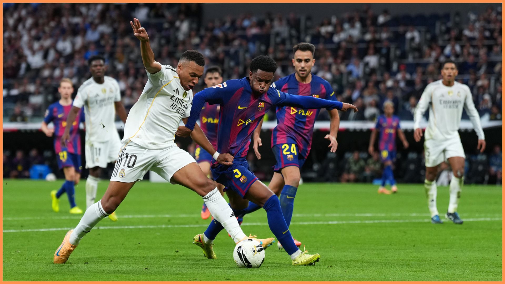 MADRID, SPAIN - OCTOBER 26: Kylian Mbappe of Real Madrid is challenged by Alejandro Balde of FC Barcelona during the LaLiga EA Sports match between Real Madrid CF and FC Barcelona at Estadio Santiago Bernabeu on October 26, 2025 in Madrid, Spain.