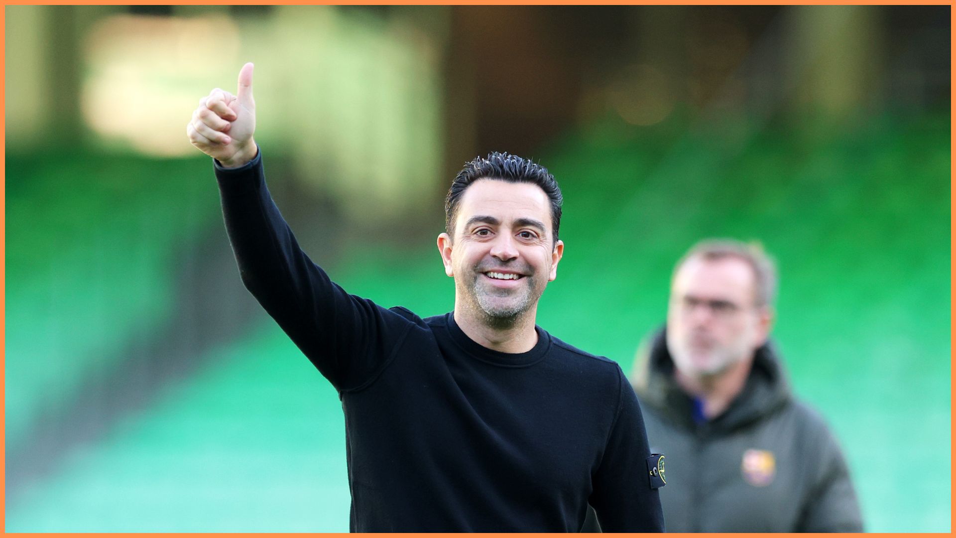 SEVILLE, SPAIN - JANUARY 21: Xavi, Head Coach of FC Barcelona, reacts as he inspects the pitch prior to the LaLiga EA Sports match between Real Betis and FC Barcelona at Estadio Benito Villamarin on January 21, 2024 in Seville, Spain.