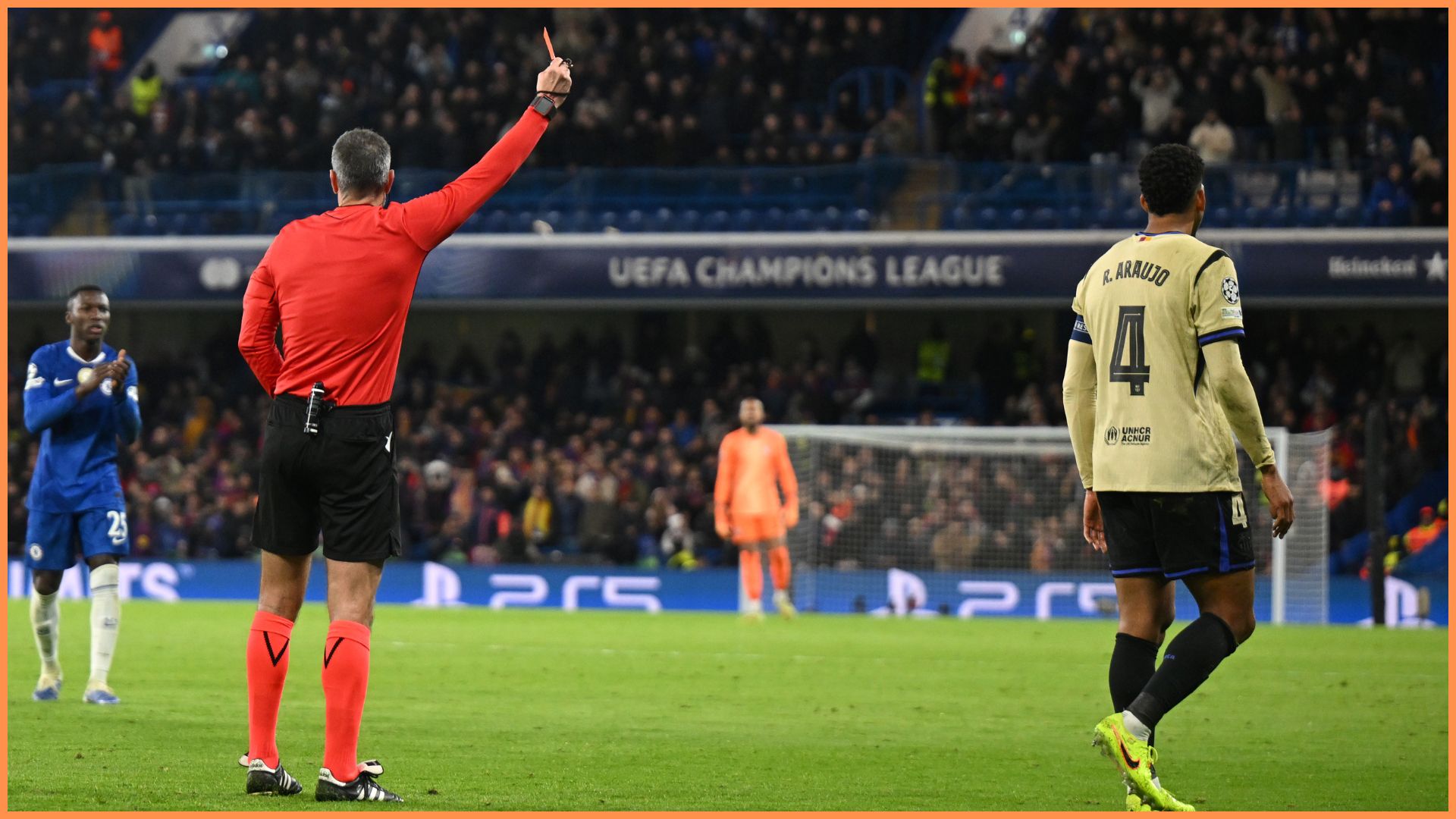 LONDON, ENGLAND - NOVEMBER 25: Ronald Araujo of FC Barcelona is shown a red card by referee Slavko Vincic during the UEFA Champions League 2025/26 League Phase MD5 match between Chelsea FC and FC Barcelona at Stamford Bridge on November 25, 2025 in London, England.