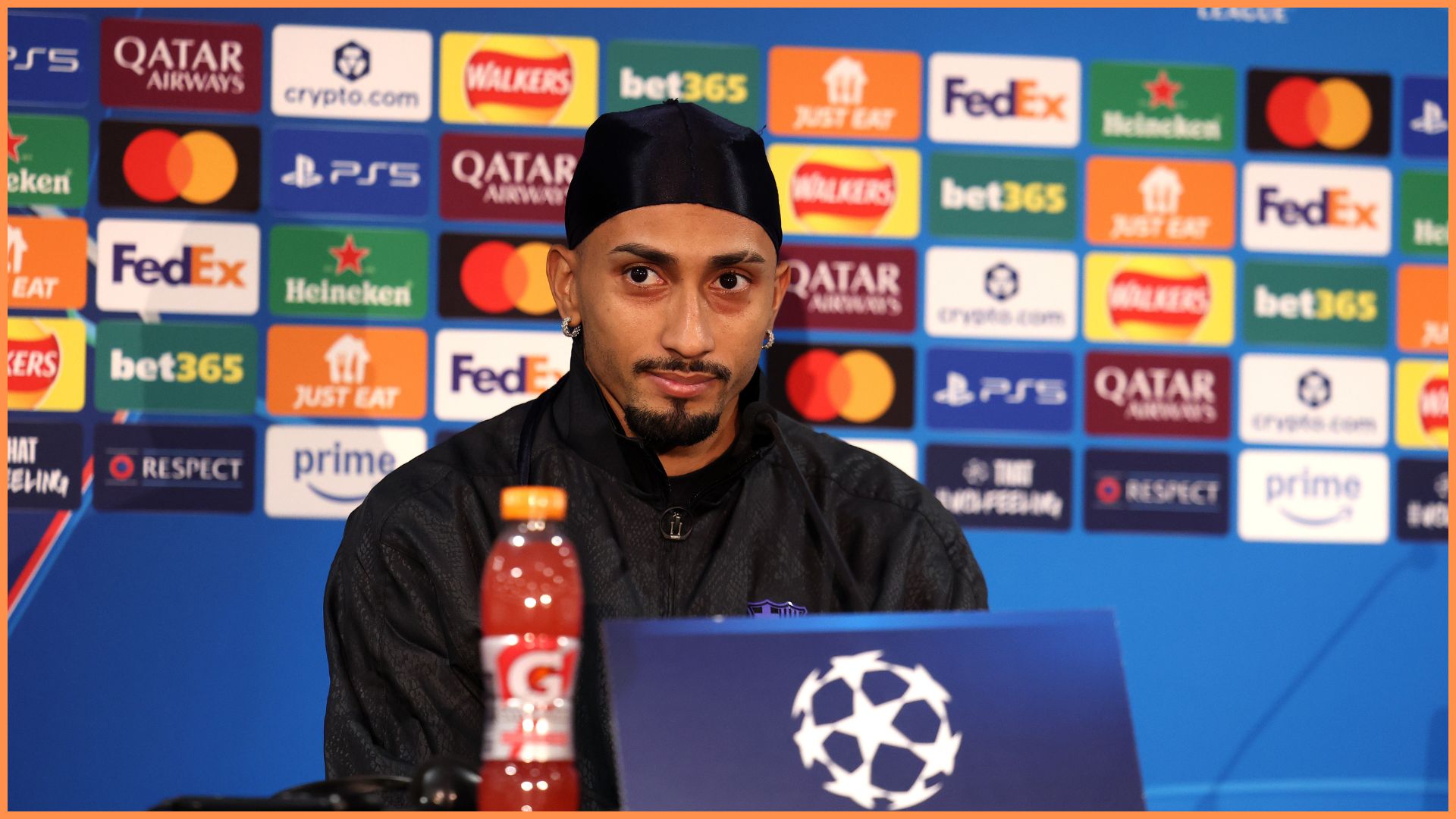 LONDON, ENGLAND - NOVEMBER 24: Raphinha of FC Barcelona looks on during a FC Barcelona Press Conference at Stamford Bridge on November 24, 2025 in London, England.
