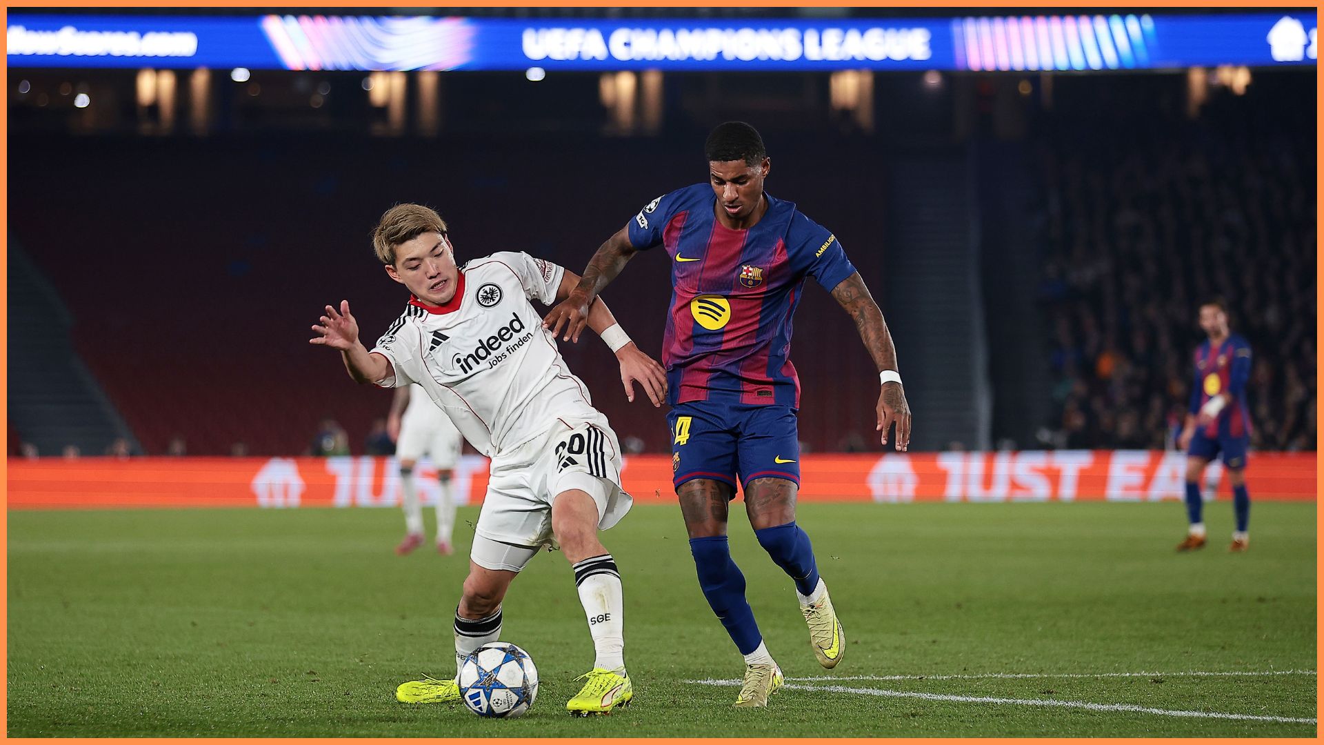 BARCELONA, SPAIN - DECEMBER 09: Ritsu Doan of Eintracht Frankfurt is challenged by Marcus Rashford of FC Barcelona during the UEFA Champions League 2025/26 League Phase MD6 match between FC Barcelona and Eintracht Frankfurt at Camp Nou on December 09, 2025 in Barcelona, Spain.
