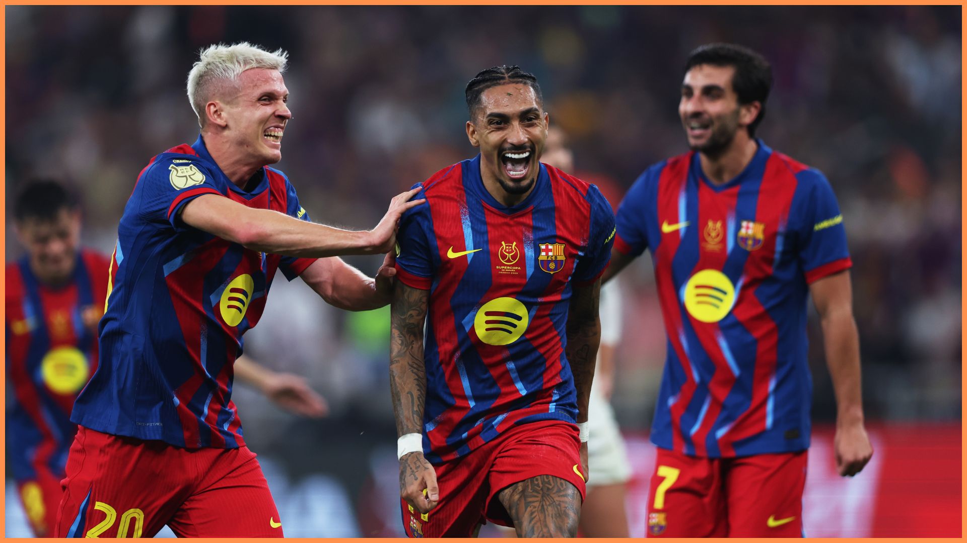 JEDDAH, SAUDI ARABIA - JANUARY 11: Raphinha of FC Barcelona celebrates scoring his team's third goal with teammate Dani Olmo during the Spanish Super Cup Final between FC Barcelona and Real Madrid at King Abdullah Sports City Hall Stadium on January 11, 2026 in Jeddah, Saudi Arabia.