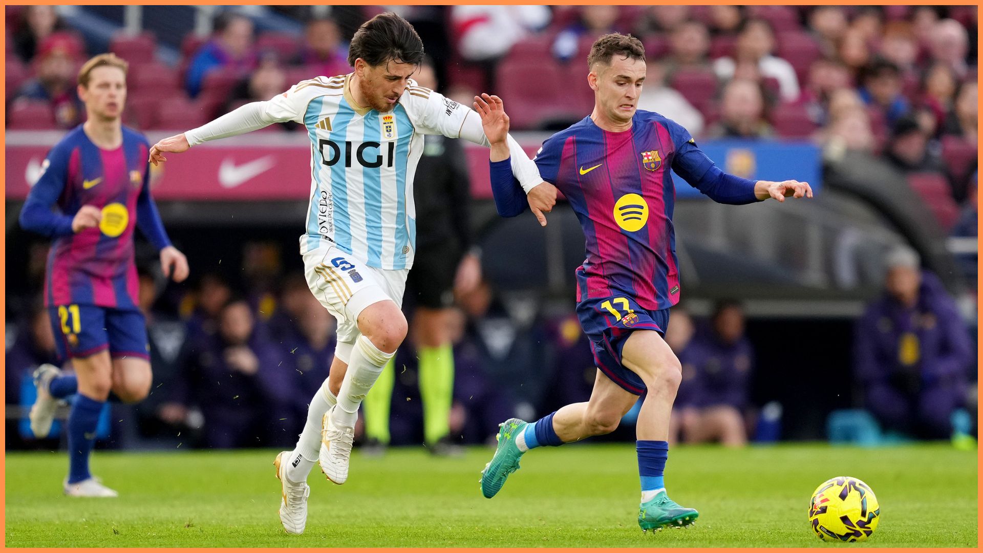 BARCELONA, SPAIN - JANUARY 25: Marc Casado of FC Barcelona is challenged by Alberto Reina of Real Oviedo during the LaLiga EA Sports match between FC Barcelona and Real Oviedo at Spotify Camp Nou on January 25, 2026 in Barcelona, Spain.