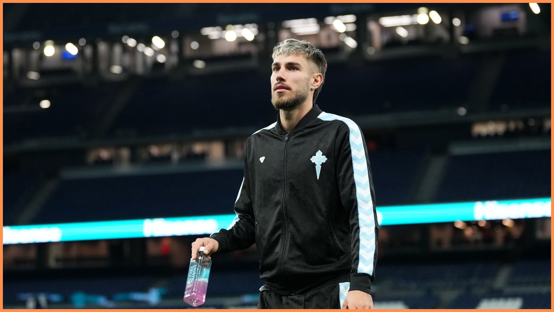 MADRID, SPAIN - DECEMBER 07: Oscar Mingueza of Celta Vigo inspects the pitch prior to the LaLiga EA Sports match between Real Madrid CF and RC Celta de Vigo at Estadio Santiago Bernabeu on December 07, 2025 in Madrid, Spain.