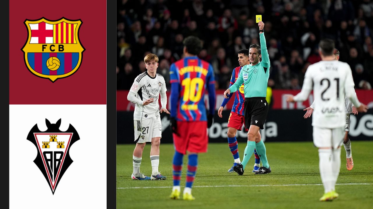 ALBACETE, SPAIN - FEBRUARY 03: Referee, Munuera Montero shows a yellow card to Daniel Bernabeu of Albacete Balompie during the Copa Del Rey Quarter Final match between Albacete Balompie and FC Barcelona at Estadio Carlos Belmonte on February 03, 2026 in Albacete, Spain.