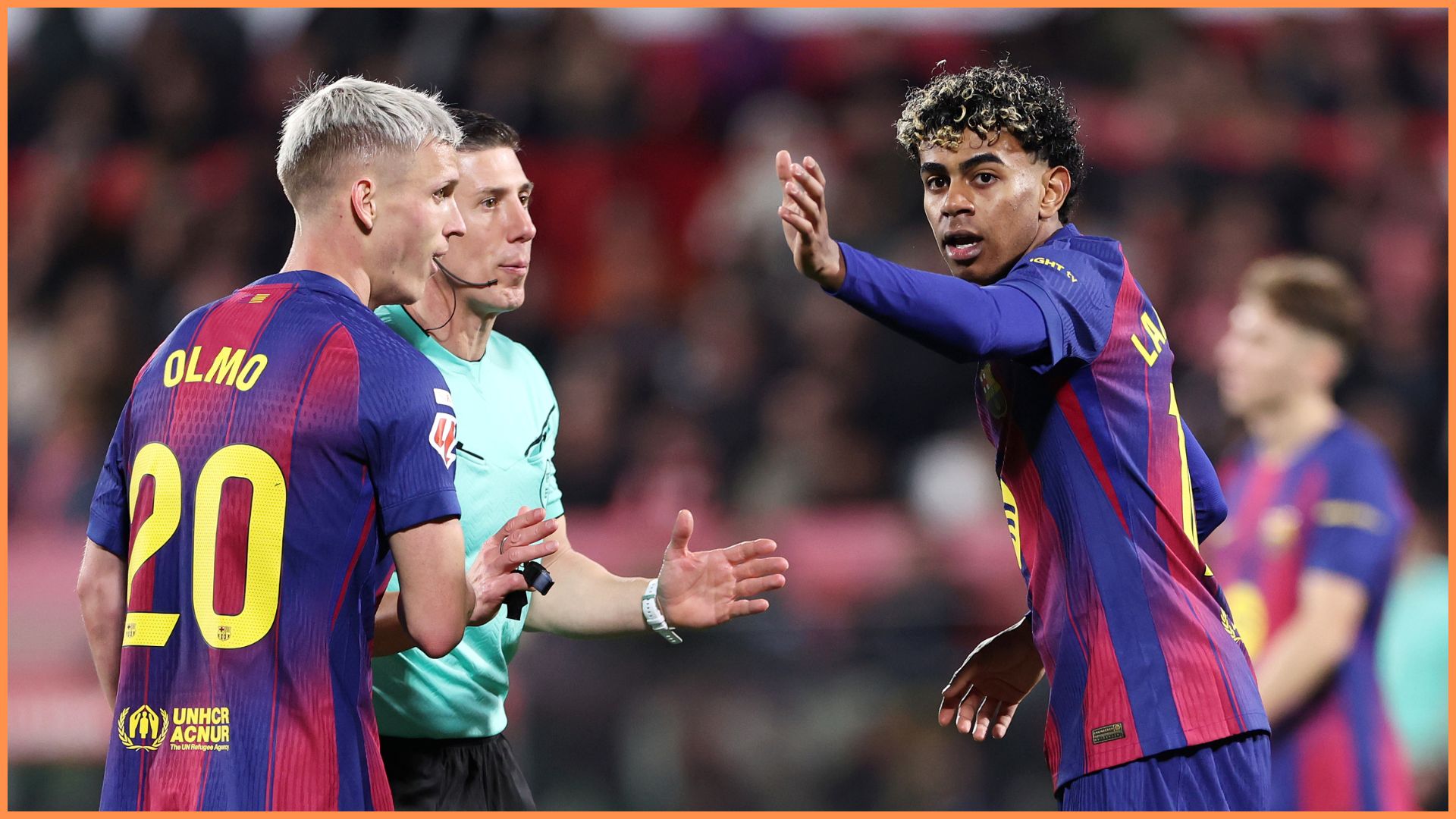 GIRONA, SPAIN - FEBRUARY 16: Dani Olmo and Lamine Yamal of FC Barcelona speak to Referee Cesar Soto during the LaLiga EA Sports match between Girona FC and FC Barcelona at Montilivi Stadium on February 16, 2026 in Girona, Spain.