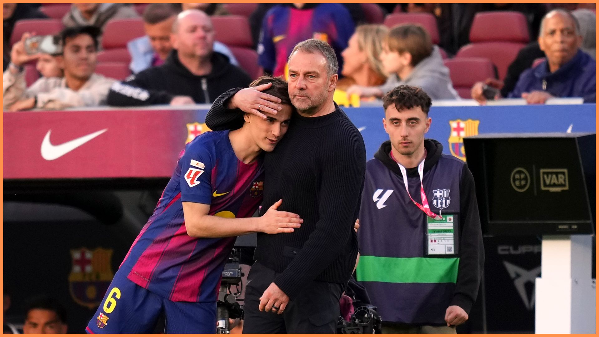 BARCELONA, SPAIN - MARCH 15: Hansi Flick, Head Coach of FC Barcelona, interacts with Gavi during the LaLiga EA Sports match between FC Barcelona and Sevilla FC at Spotify Camp Nou on March 15, 2026 in Barcelona, Spain.