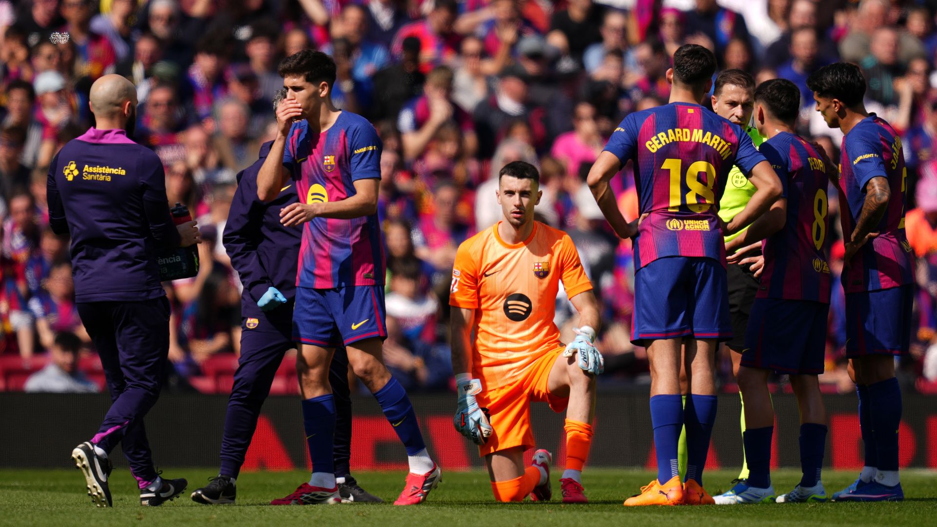 BARCELONA, SPAIN - MARCH 22: Joan Garcia of FC Barcelona receives medical treatment during the LaLiga EA Sports match between FC Barcelona and Rayo Vallecano de Madrid at Spotify Camp Nou on March 22, 2026 in Barcelona, Spain.