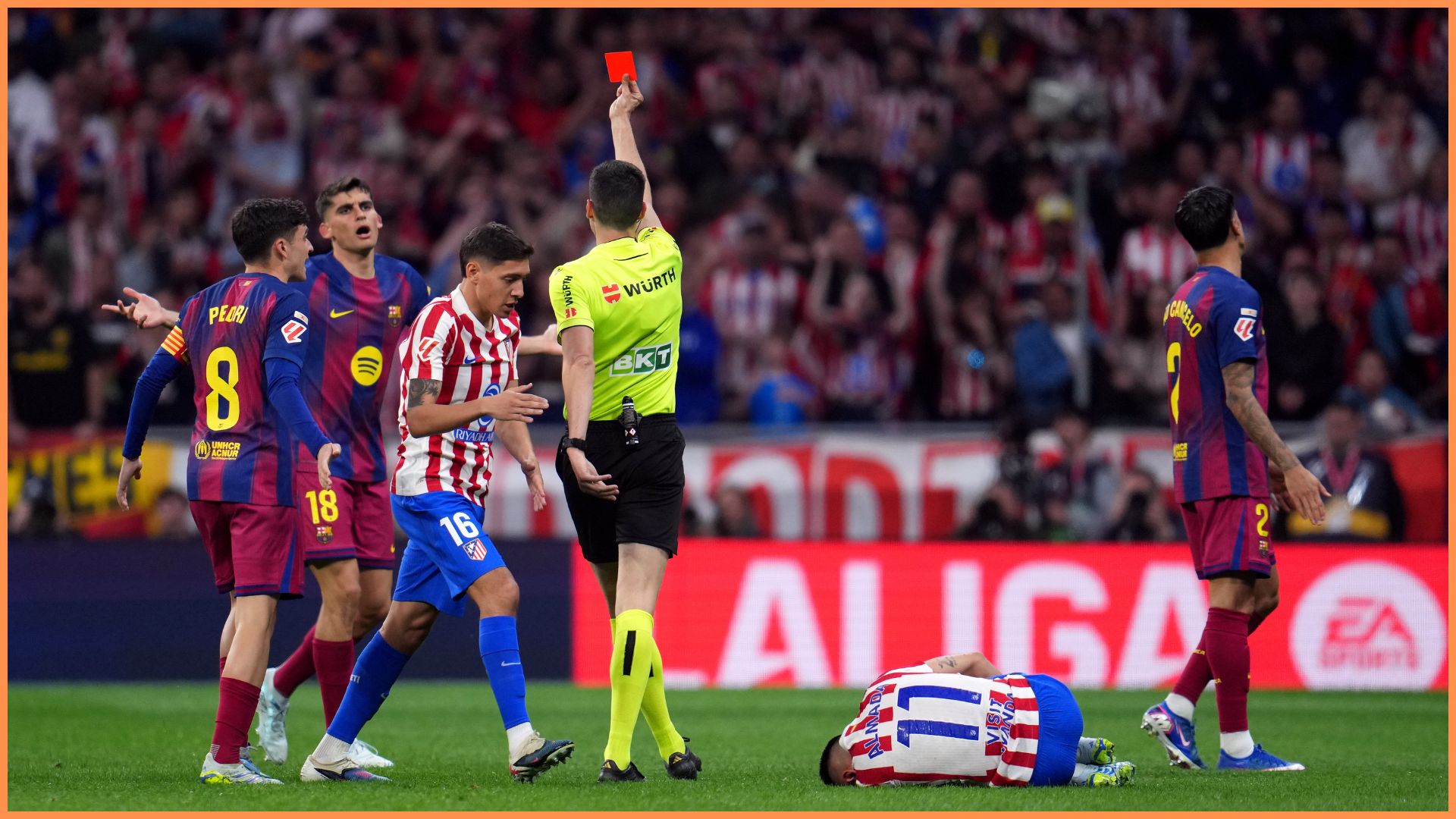 MADRID, SPAIN - APRIL 04: Gerard Martin of FC Barcelona receives a red card from the Referee during the LaLiga EA Sports match between Atletico de Madrid and FC Barcelona at Riyadh Air Metropolitano on April 04, 2026 in Madrid, Spain.
