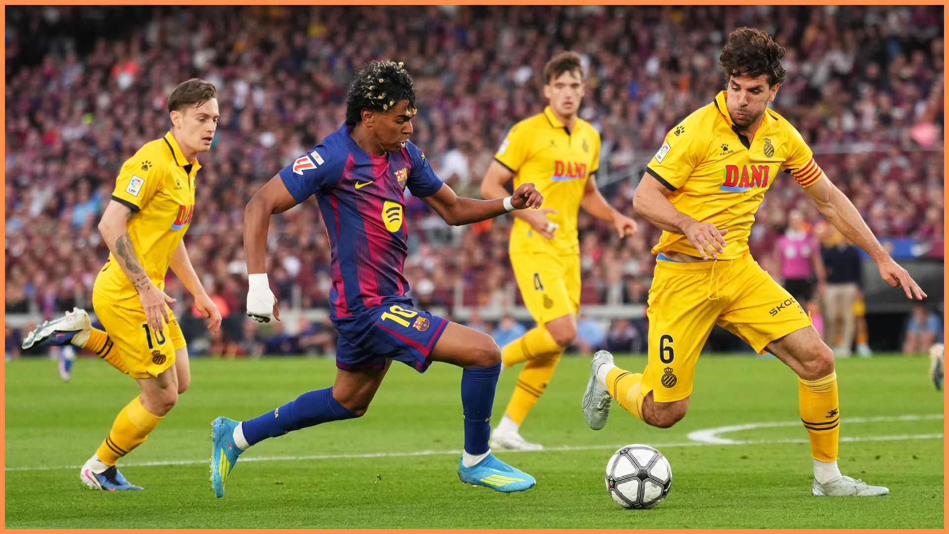 BARCELONA, SPAIN - APRIL 11: Lamine Yamal of FC Barcelona runs with the ball under pressure from Leandro Cabrera of RCD Espanyol during the LaLiga EA Sports match between FC Barcelona and RCD Espanyol de Barcelona at Spotify Camp Nou on April 11, 2026 in Barcelona, Spain.