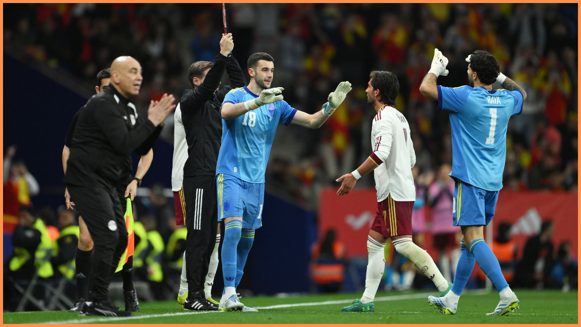 BARCELONA, SPAIN - MARCH 31: Joan Garcia of Spain high fives Ferran Torres as he comes on as a substitute for teammate David Raya during an international friendly match between Spain and Egypt at RCDE Stadium on March 31, 2026 in Barcelona, Spain.
