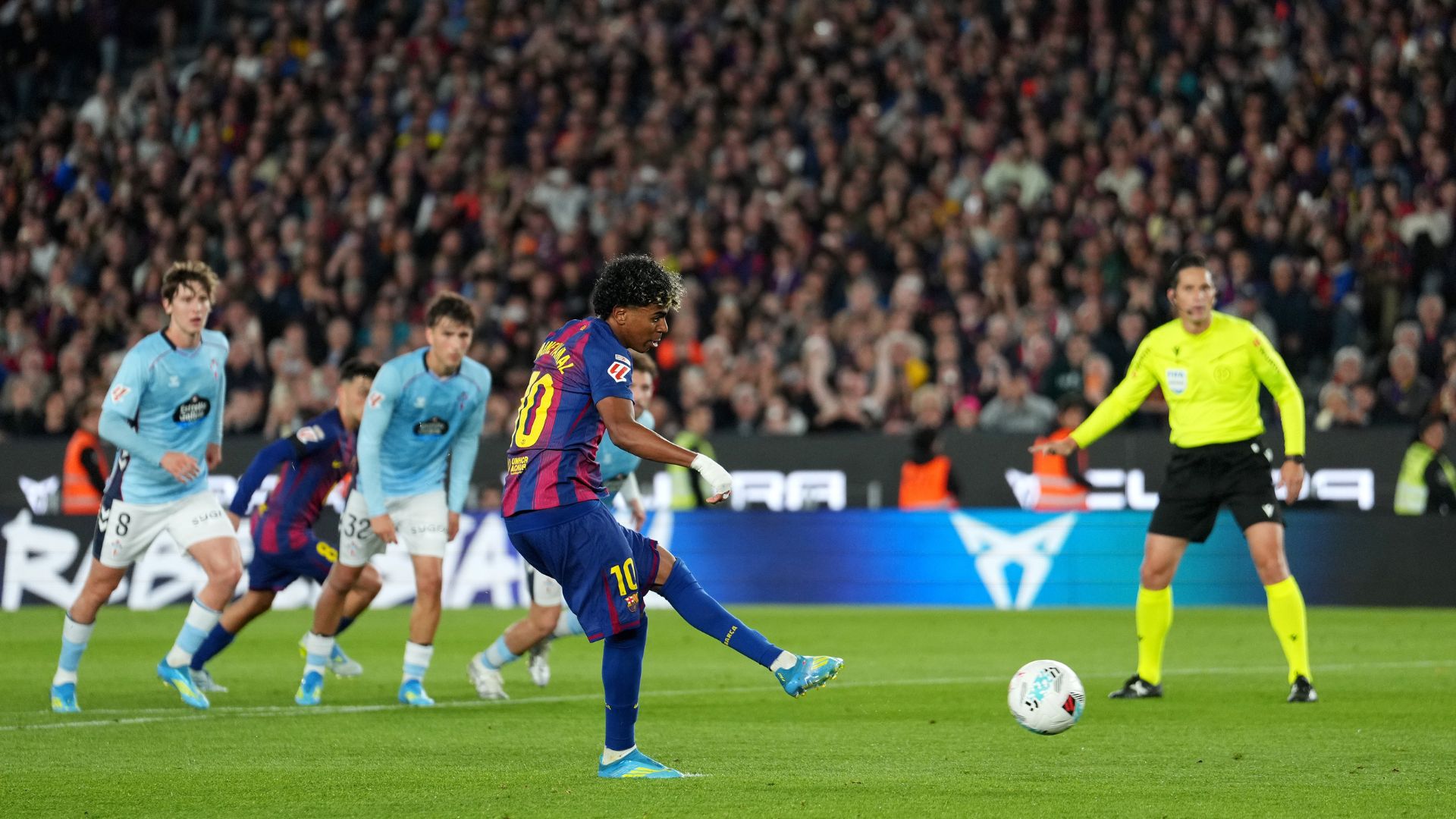BARCELONA, SPAIN - APRIL 22: Lamine Yamal of FC Barcelona scores his team's first goal from the penalty spot during the LaLiga EA Sports match between FC Barcelona and RC Celta de Vigo at Spotify Camp Nou on April 22, 2026 in Barcelona, Spain.