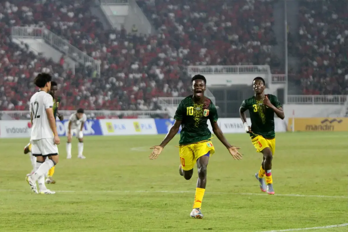 August 18, 2025, Deli Serdang Regency, North Sumatra, Indonesia: Mali U-17 national team player Seydou Dembele celebrates after scoring against the Indonesian U-17 national team in the 2025 Independence Cup tournament at the Main Stadium in North Sumatra. The Mali national team won the main title in the tournament by defeating the Indonesian national team 2-1.