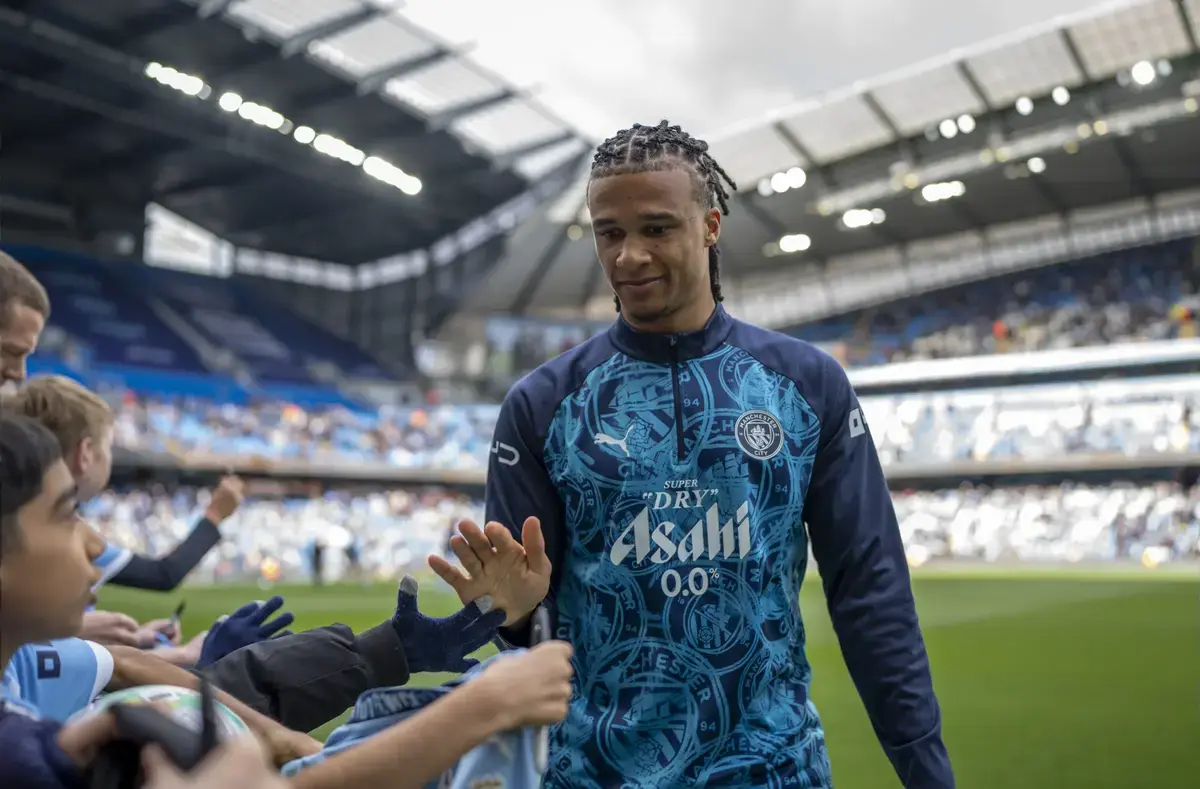 Nathan Ake of Manchester City greets fans following his warm up ahead of kick-off during the Premier League match between Manchester City and Arsenal at the Etihad Stadium, Manchester, England. Sunday 19th April 2026.